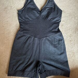 target workout bodysuit size large, fits like a medium